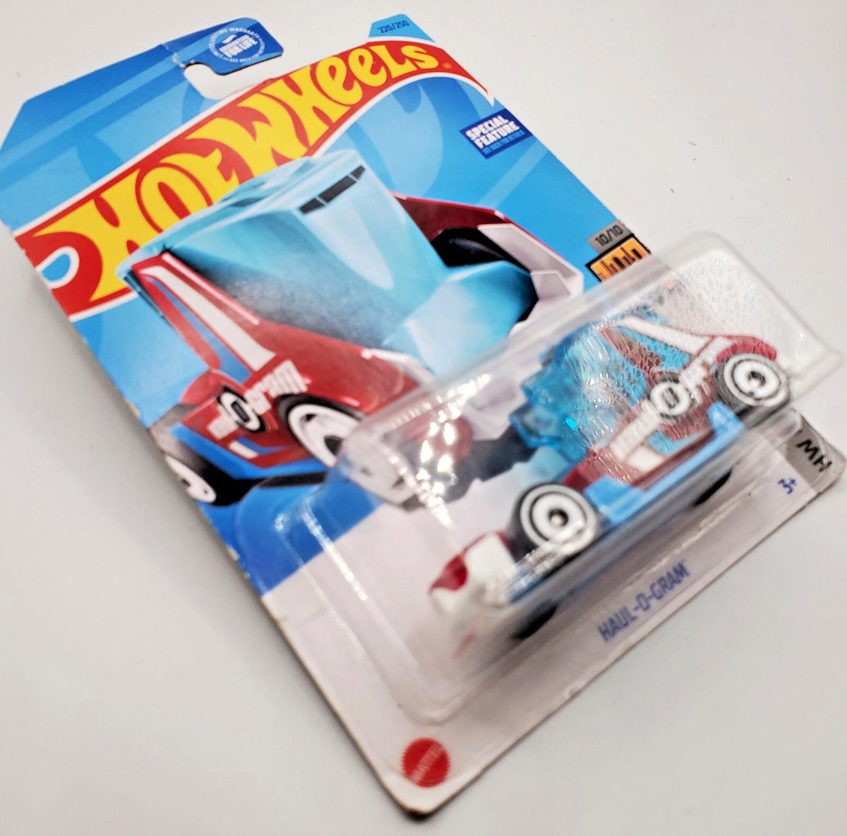 Hot Wheels 2023 Haul-O-Gram #220 Blue/Red NEW on Non-Perfect Blister Card